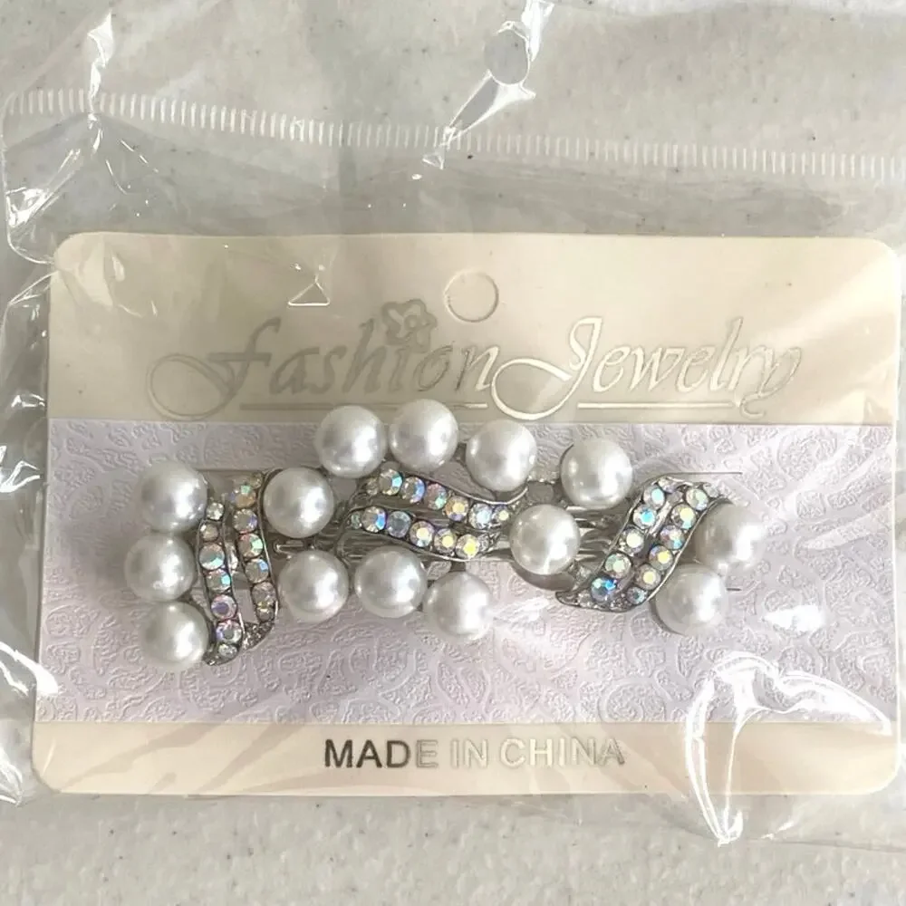 New in package Fashion Jewelry hair clip white pearls/rhinestones
